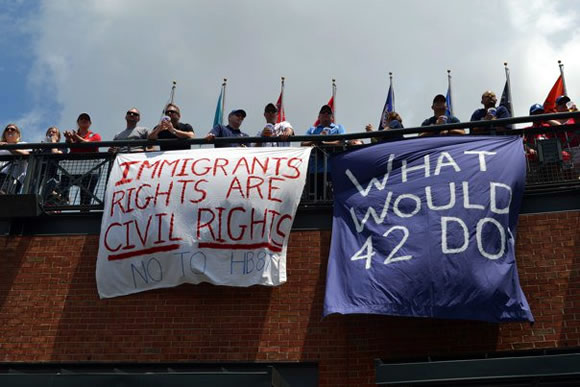 banner with 'immigrant rights are civil rights'